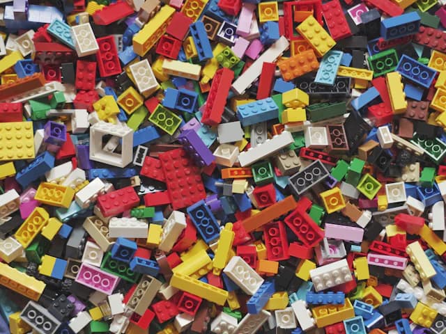 A heap of coloured building bricks